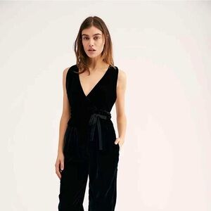 Free People Black Velvet Jumpsuit Romper
Size L Criss-Cross Back